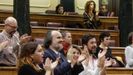Rodríguez, Fernán Vello, Díaz y Gómez Reino aplauden desde tres filas más adelante que Fernández