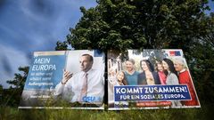  esquerda, cartel electoral do candidato del Partido Popular Europeo, Manfred Weber, e  dereita o da candidata do Partido Socialdemcrata de Alemaa, Katarina Barley, en Lauf (Alemaa)