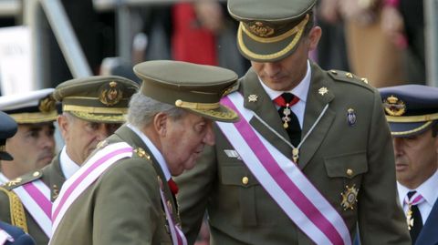 Felipe VI y Juan Carlos I en un acto en El Escorial en el 2014