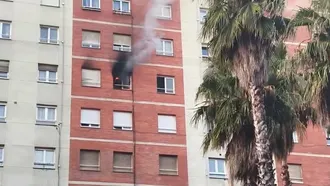 Incendio de una vivienda en el centro de Gij�n
