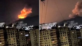 Una columna de humo se eleva tras una explosi�n en Caracas (Venezuela).