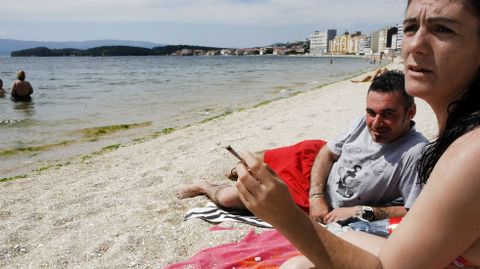 Fumadores en la playa de Compostela.Fumadores en la playa de Compostela