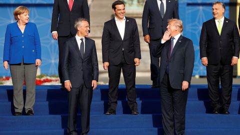 Trump intenta bromear con Merkel despus de convertirla en la diana de su furia