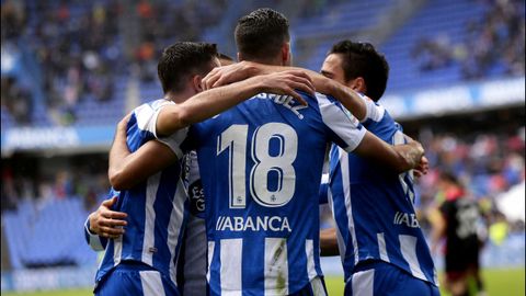 Los futbolistas del Dépor celebran el gol a los 40 segundos del partido contra el Reus