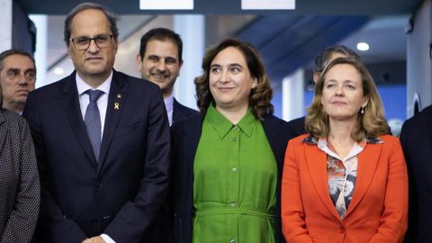 Quim Torra, este martes, junto a la alcaldesa de Barcelona, Ada Colau, y la ministra de Economía, Nadia Calviño