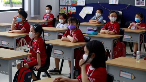 Los alumnos deben llevar mascarillas en los colegios de Ho Chi Minh, Vietnam