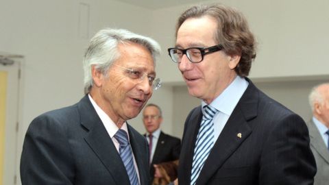 Julio Fernández Gayoso y José Luis Méndez, en el 2010, cuando se fusionaron las cajas gallegas