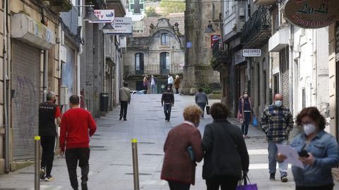 Una calle del centro de Marín, municipio que ayer tenía 103 casos de covid y seguirá en el nivel alto de restricciones