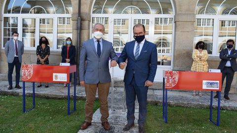 José Tomé y Antonio López en la firma del convenio