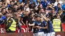 Los jugadores del Oviedo celebran el gol de Sergi Enrich ante el Sporting