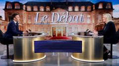 Emmanuel Macron y Marine Le Pen, este miércoles, durante el debate televisivo de cara a la segunda vuelta de las elecciones presidenciales francesas