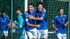 Enzo Cazorla y Diego Ruiz se abrazan, con Sal Arias y Diego Cazorla por detrs