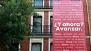 Imagen de la fachada de la sede del PSOE en Madrid con su nuevo lema