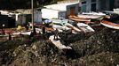 A las diez de la mañana del 10 de septiembre de 1996, 200.000 toneladas de basura del vertedero de Bens enterraban O Portiño