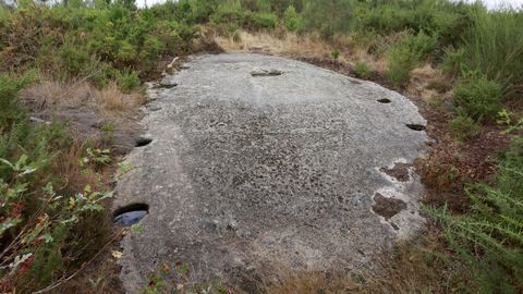 Altar o longhouse de Adai, única cabaña prehistórica excavada en granito