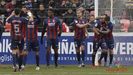 Jugadores del Huesca celebran uno de sus goles al Numancia