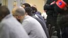 Agentes especiales tras los procesados por los atentados de Bruselas de marzo del 2016