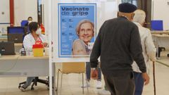 Cartel de la campaa de la gripe en el centro de vacunacin de la FIMO de Ferrol