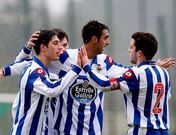 Romay (centro), Vela (derecha) y Lemos celebran el primer gol del partido.