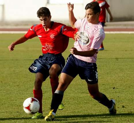 B�scate en la Vuelta a Espa�a a su paso por Ancares.Gerardo Fern�ndez y Javier Pitillas el a�o pasado en la plaza del Obradoiro