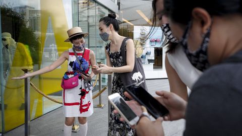 Para poder acceder a un centro comercial de Bangkok, los clientes han de instalar una aplicacin en su telfono