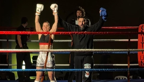 Esther, junto a su entrenador Luis Mol�ns, tras la victoria