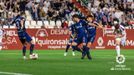 Tarín despeja un balón ante Pomares y Luengo durante el Albacete-Oviedo