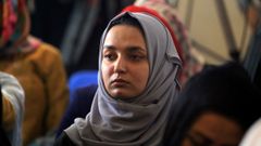 Una mujer afgana en un encuentro en el que reclaman la apertura de las escuelas de secundaria a las mujeres.