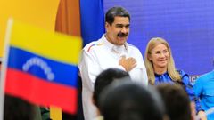Nicols Maduro, junto a la primera dama, Cilia Flores, encabezando un acto por el inicio del ao acadmico universitario el martes, en Caracas (Venezuela)