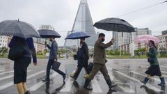 Gente con mascarillas en Corea del Norte
