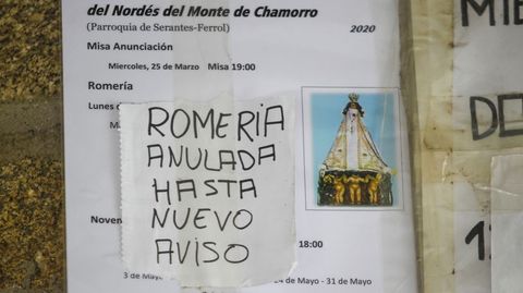 Cartel colocado a la entrada del templo, anunciando la cancelacin de la popular romera