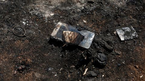 El mvil de una vctima localizada en el lugar donde se encontraron 26 cadveres calcinados