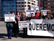 Protesta de los comerciantes de A Pedra, en una concentraci�n ante los juzgados de Vigo