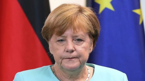 Cara de circunstancias de Angela Merkel.
