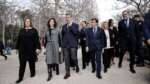 Ayuso, junto a Feijoo y Almeida, durante el homenaje en recuerdo de las víctimas del 11M en Madrid.