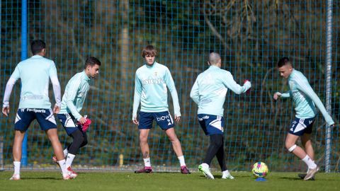 Yayo y Osky, junto a Masca, Hugo Rama y Juanfran durante el entrenamiento del Oviedo