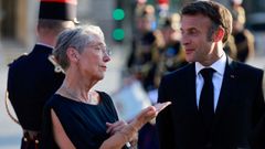 Borne y Macron, en un acto el 14 de julio del 2023 en el Louvre.