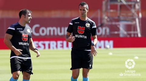 Luis Mario Milla Alvendiz, a la derecha