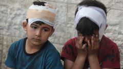 Niños gazatíes desplazados a Deir al Balah, 